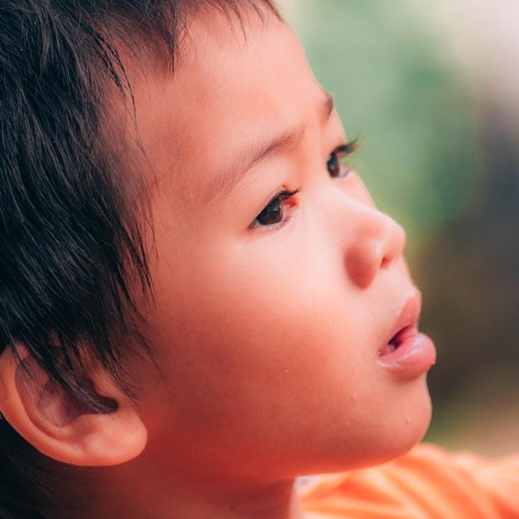Kaveri Mehta, Lead Design Curator at Integrated Process Structure, reviewing corporate floral arrangements